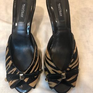 Tan zebra print faux fur heels